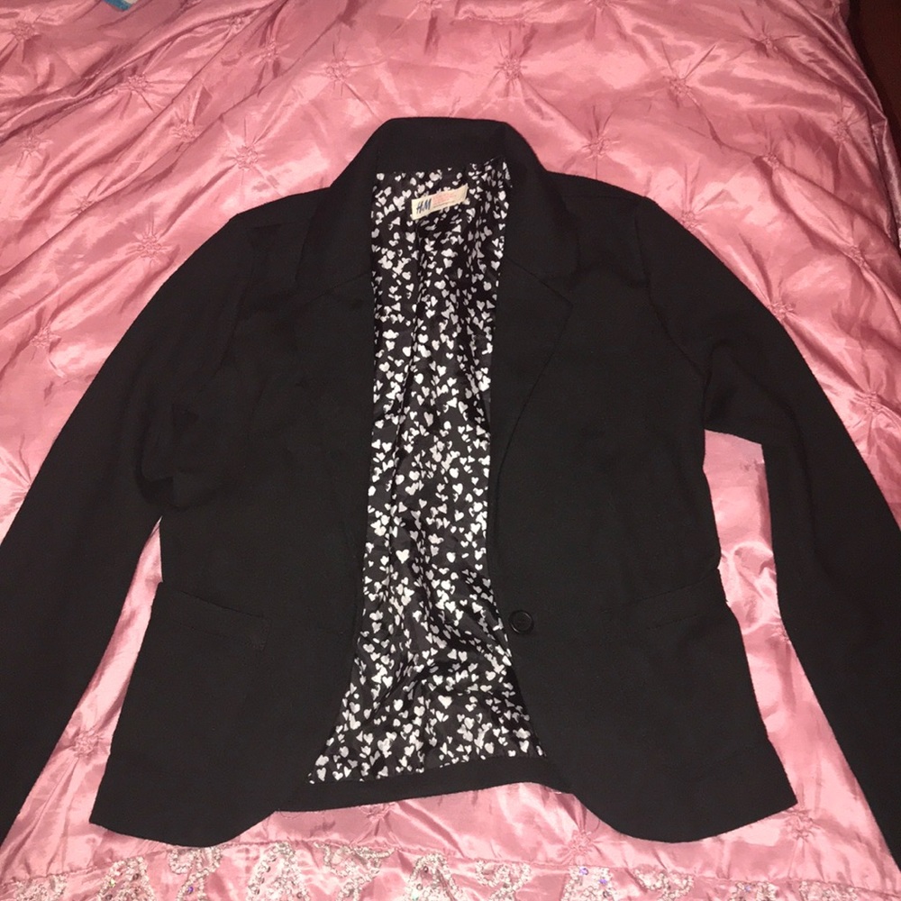 A black long sleeve blazer